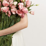 Woman Holding a Bundle of Flowers
